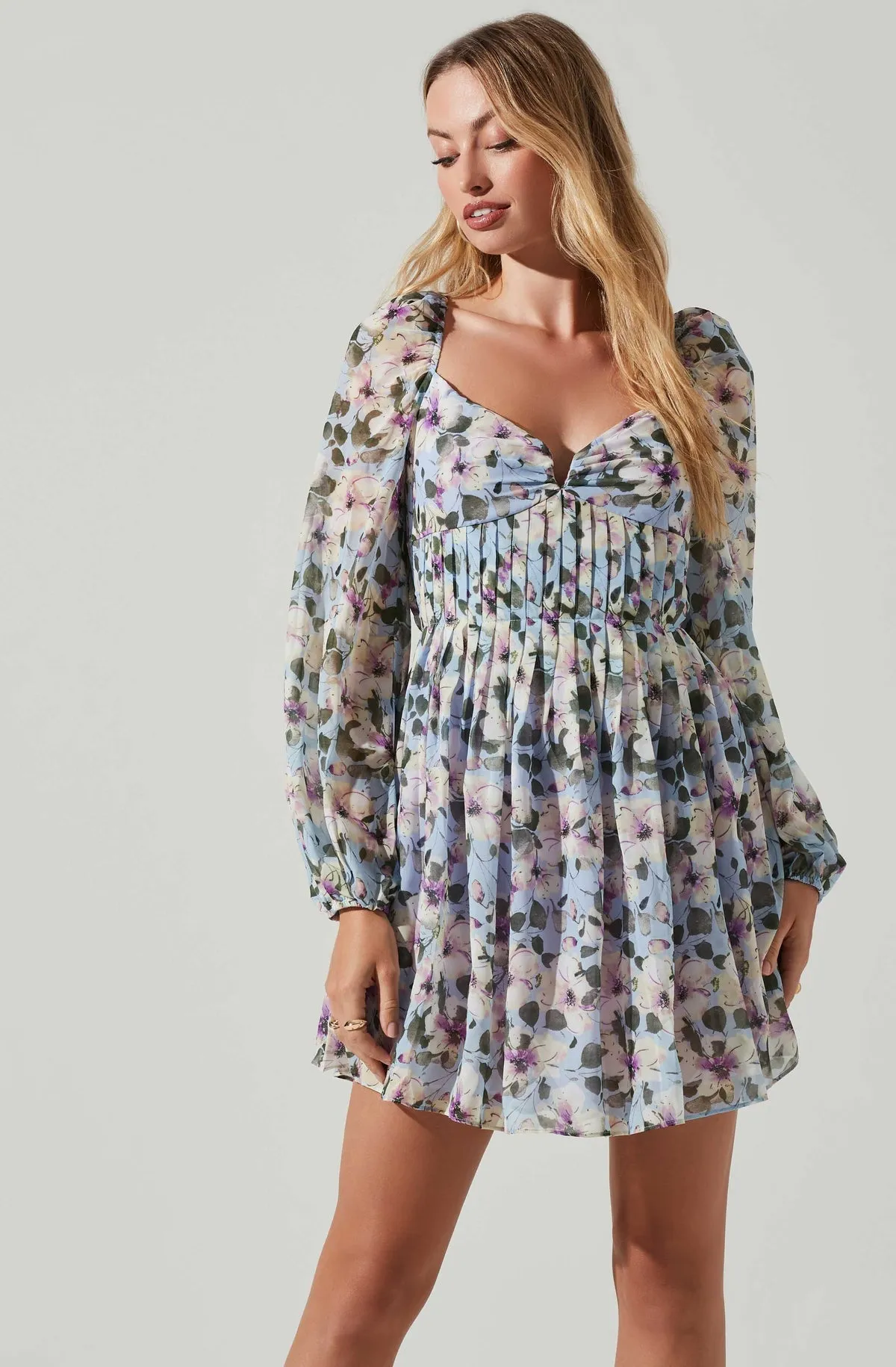 ASTR The Label Carina Floral Open Back Long-Sleeve Mini Dress in Blue Multi
