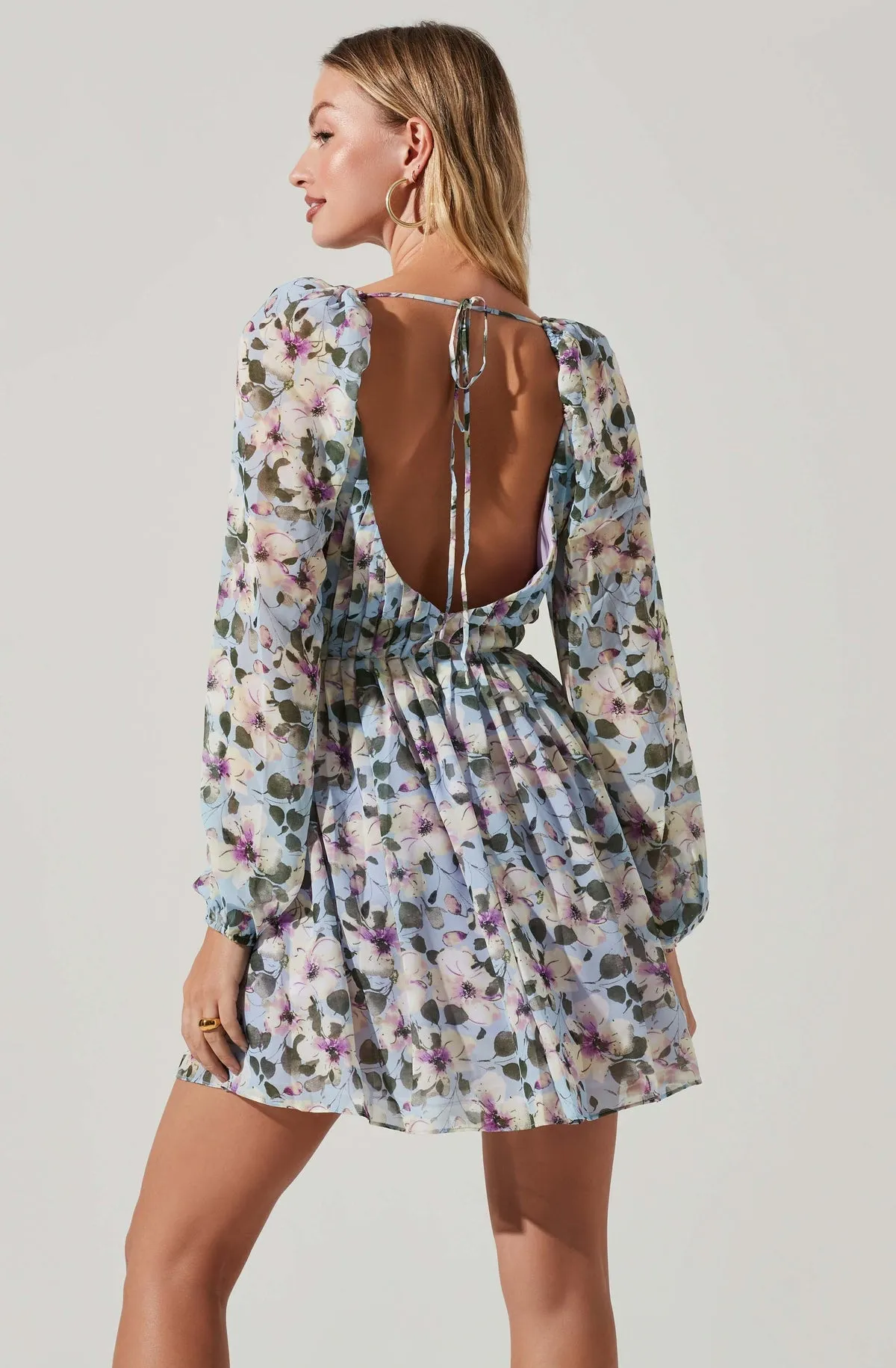 ASTR The Label Carina Floral Open Back Long-Sleeve Mini Dress in Blue Multi